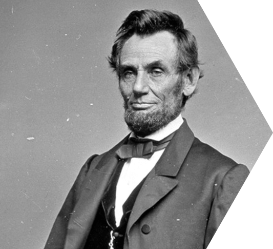 An old black and white photo of Abraham Lincoln from the chest up