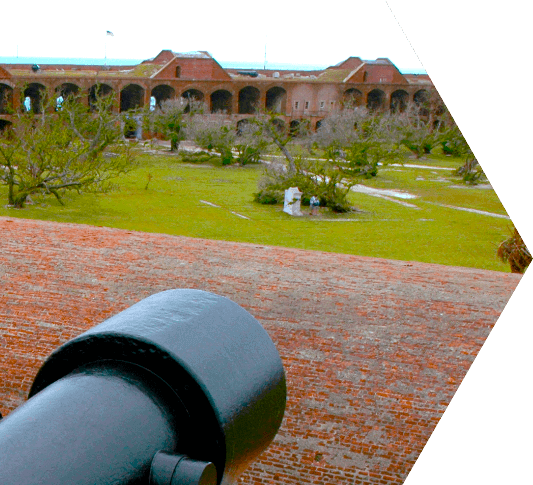 A view over a canon situated on one of the walss of Ft. Jefferson in the Dry Tortugas