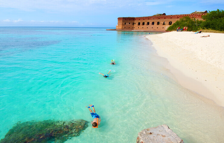 Dry Tortugas, featuring vibrant blue waters, sandy beaches