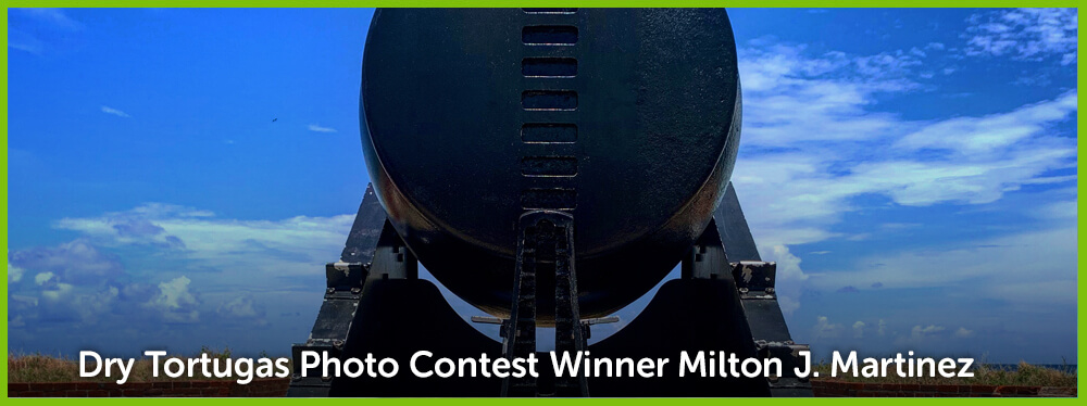 image of a august dry tortugas image showing a cannon and the words 'Dry Tortugas Photo Contest Winner Milton J. Martinez'